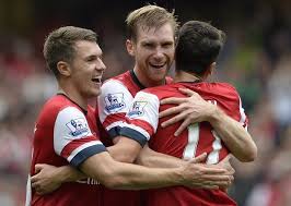 Mert celebrates with Rambo and Ozil