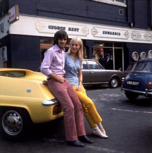 (L-R) Manchester United's George Best and his fiancee Eva Haraldsted outside his clothing boutique on Manchester's Bridge Street